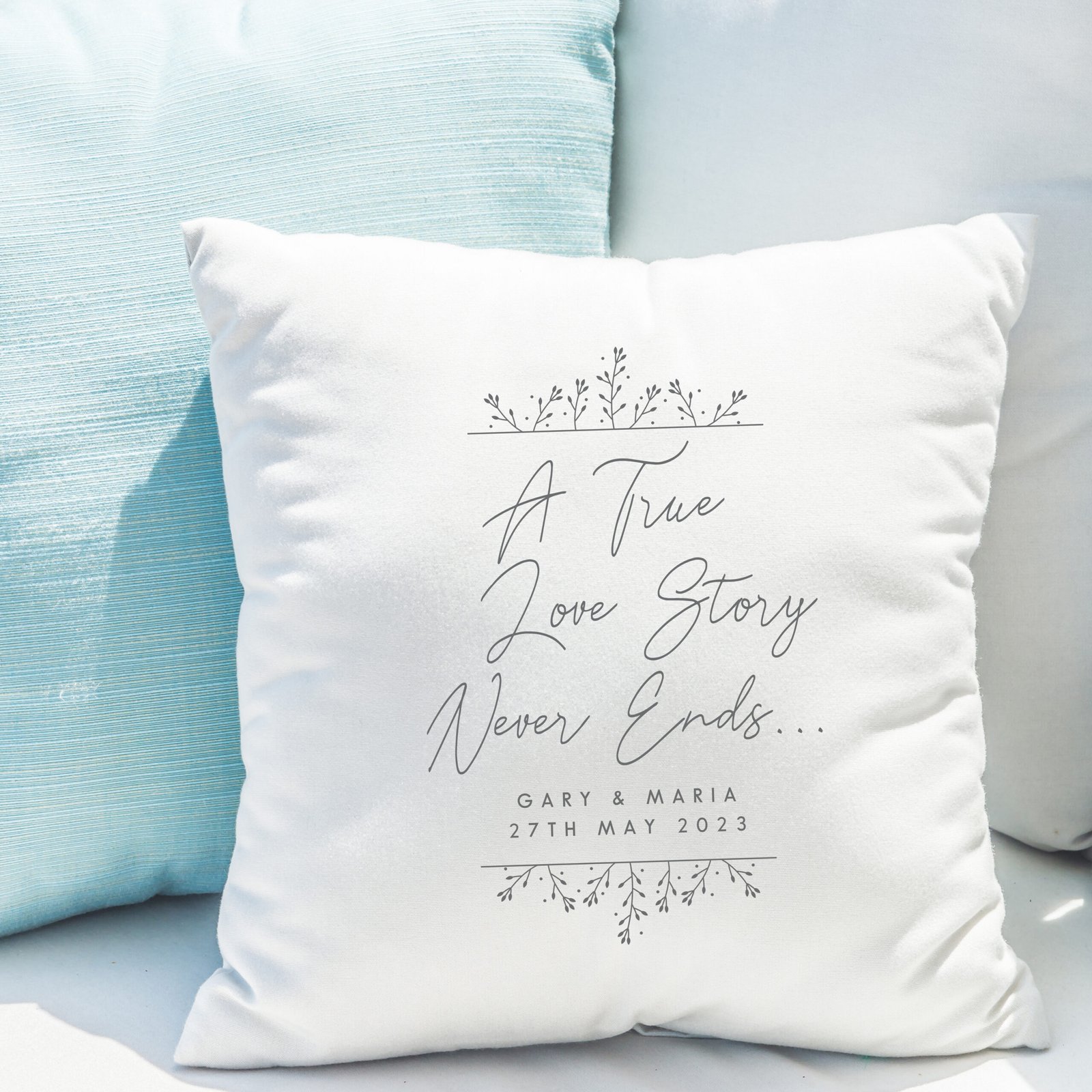 Pillow on sofa bed Personalised 'A True Love Story Never Ends' Filled Cushion - Image 1