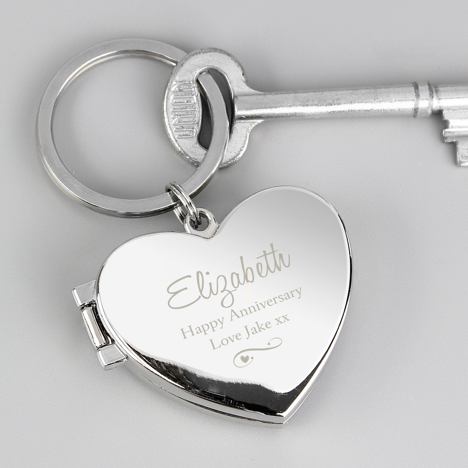 P0102U87 Personalised Swirl Heart Motif Heart Shaped Silver Nickel Plated Photoframe Keyring Personalised Swirl Heart Motif Heart Shaped Silver Nickel Plated Photoframe Keyring - Image 1