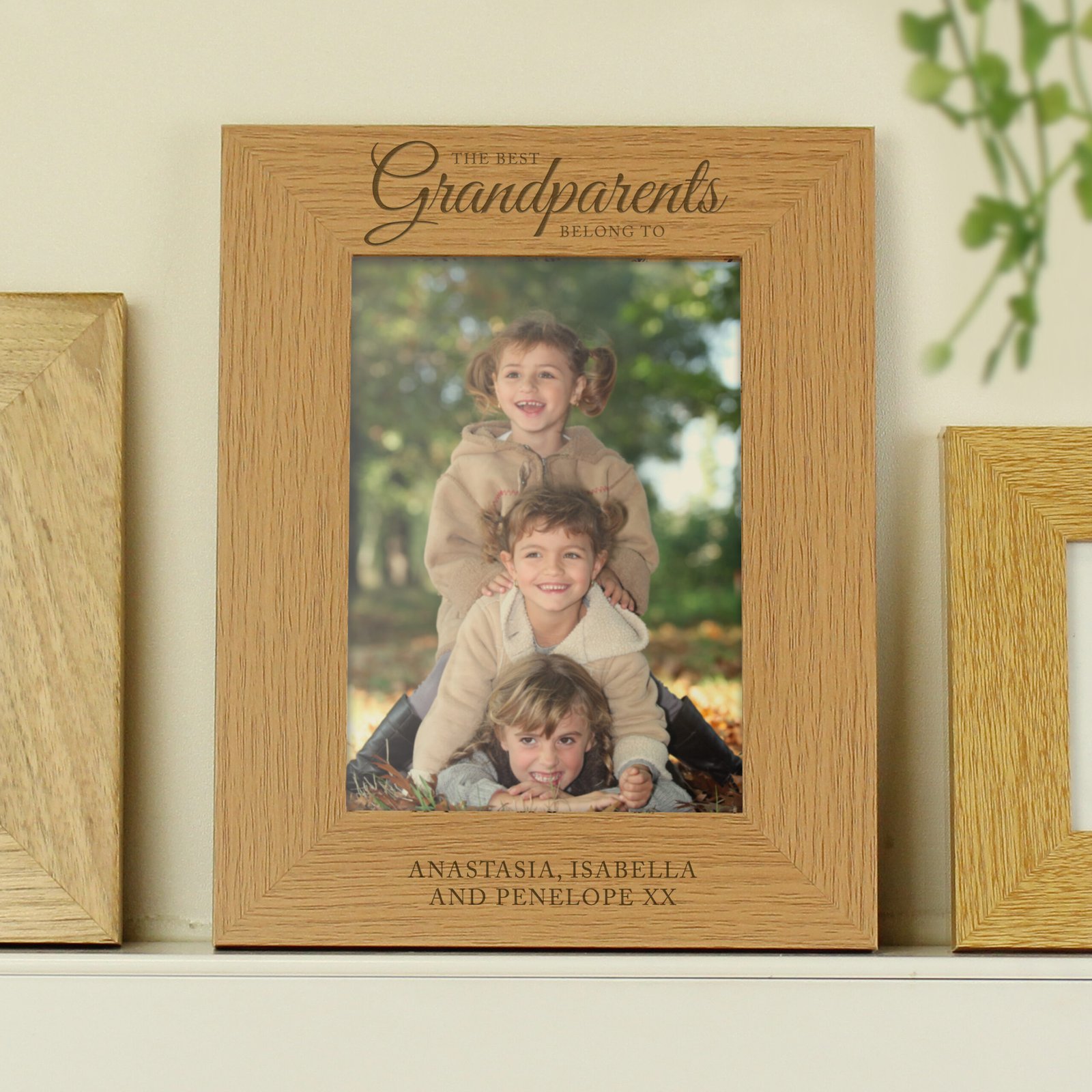 P0111B63 Personalised 'The Best Grandparents Belong To...' 5x7 Portrait Oak Finish Photo Frame Personalised 'The Best Grandparents Belong To...' 5x7 Portrait Oak Finish Photo Frame - Image 1