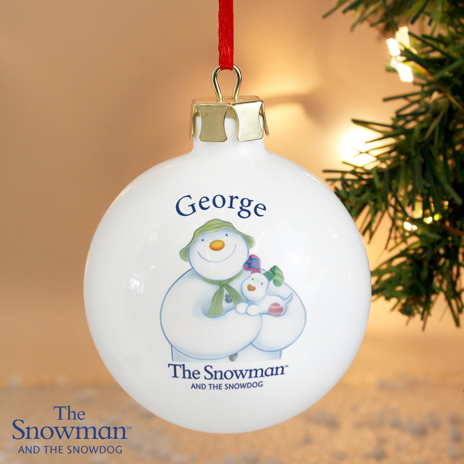 P0305G43 Personalised The Snowman and the Snowdog Christmas Ceramic Bauble Personalised The Snowman and the Snowdog Christmas Ceramic Bauble - Image 1