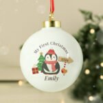Personalised 'My First Christmas' Penguin Design Ceramic Christmas Bauble - Image 3