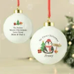 Personalised 'My First Christmas' Penguin Design Ceramic Christmas Bauble - Image 4