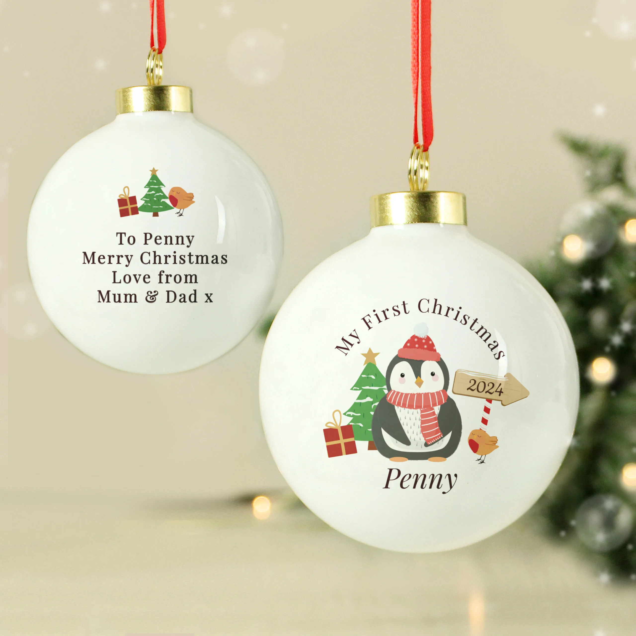 Personalised 'My First Christmas' Penguin Design Ceramic Christmas Bauble - Image 4