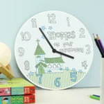 Personalised ‘On Your Christening’ Blue Whimsical Church Design Wooden Wall Clock - Image 2