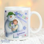 Personalised The Snowman and the Snowdog 'Merry Christmas' Blue Ceramic Mug - Image 3