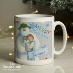 Personalised The Snowman and the Snowdog 'Merry Christmas' Blue Ceramic Mug - Image 4