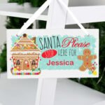 Personalised Gingerbread House Design 'Santa Stop Here' Hanging Wooden Sign