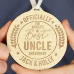 Personalised 'Officially The World's Best' Round Wooden Medal