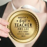Personalised 'World's Best Teacher' Round Wooden Gold Medal - Image 2