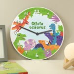 Personalised Children's Colourful Dinosaur Design Round Wooden Wall Clock - Image 2