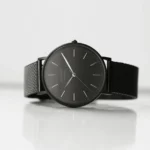 Architect London Men's Minimalist Modern Font Engraving Black Face Watch With Pitch Black Mesh Strap
