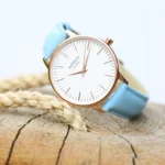 Architect London Ladies Modern Font Engraving White Face Watch With Light Blue Leather Strap