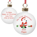 Personalised Santa with Presents Design 'My First Christmas' Ceramic Christmas Bauble - Image 4