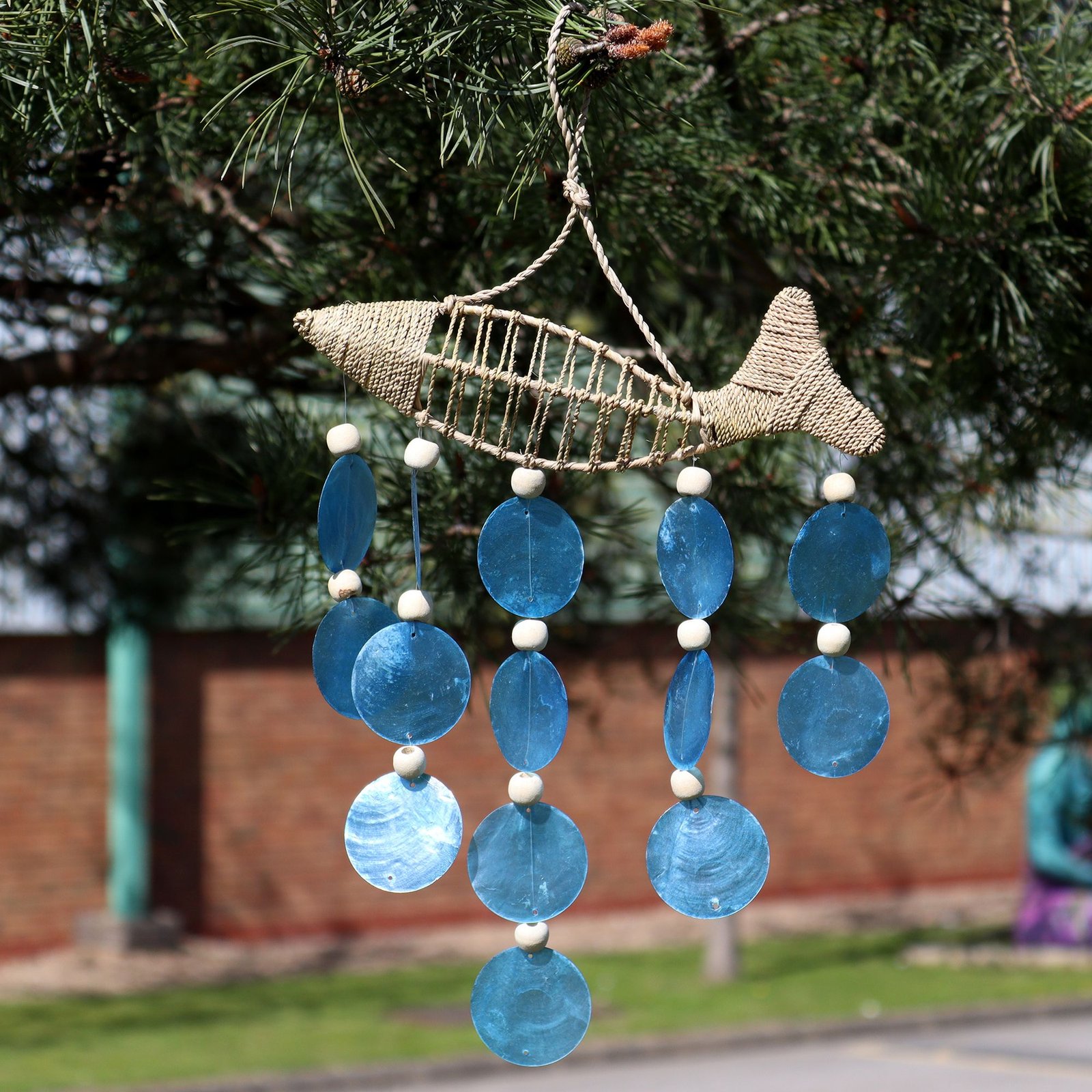 bG9jYWw6Ly9tZWRpYS8xUi80Qy82MFIzMEMxSDc0U0s0QzFSL2U0MjBiZTRiLmpwZWc.jpg Ancient Wisdom String Fish & Blue Copis Drop Wind Chime - Image 1