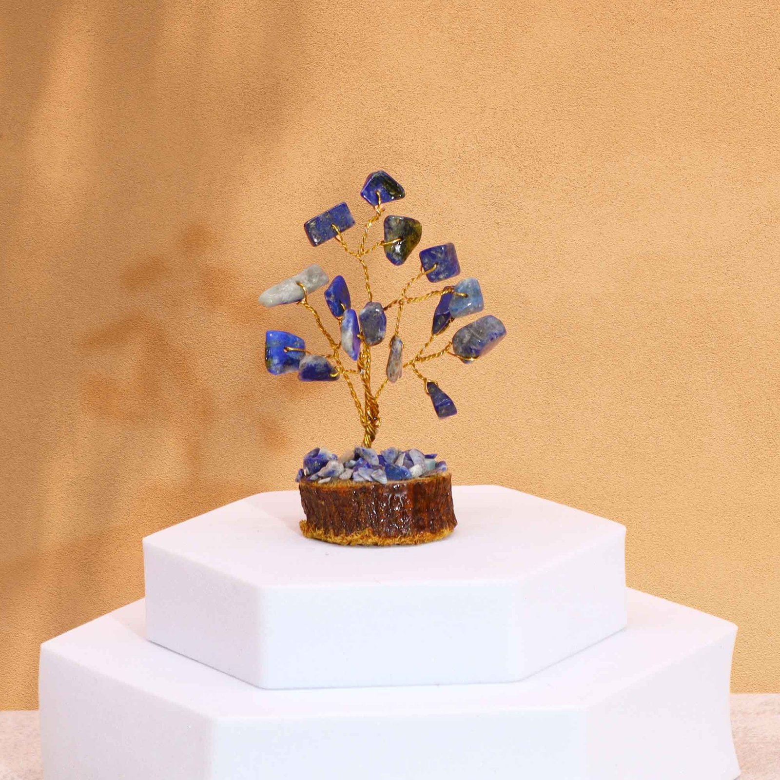 bG9jYWw6Ly9tZWRpYS85Ti9HQy82MFIzMEMxRzZXUjNHQzlOL2I5ZjkxYTcxLmpwZWc.jpg Ancient Wisdom Mini Sodalite Gemstone Tree (15 Stones) On Wooden Base - Image 1