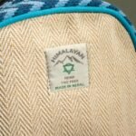 Ancient Wisdom Medium Handmade Kathmandu Backpack – Dhaka Design (30x21x9cm) - Image 5
