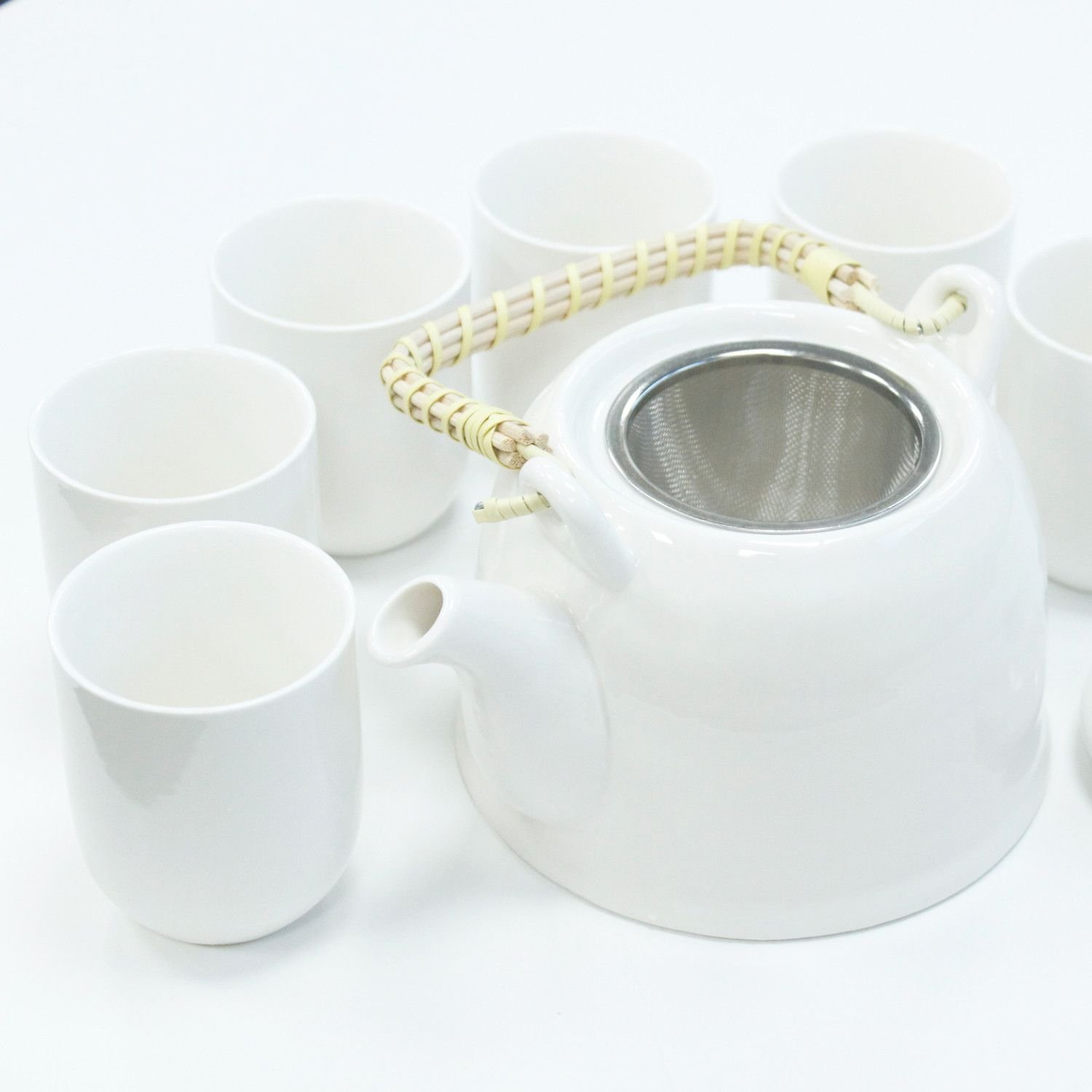 bG9jYWw6Ly9tZWRpYS8xSy9HQy82MFIzMEMxRzZNVDNHQzFLL2U3OTAyMDViLmpwZWc.jpg Ancient Wisdom Ceramic Herbal Teapot & 6 Matching Tea Cups – Classic White - Image 1