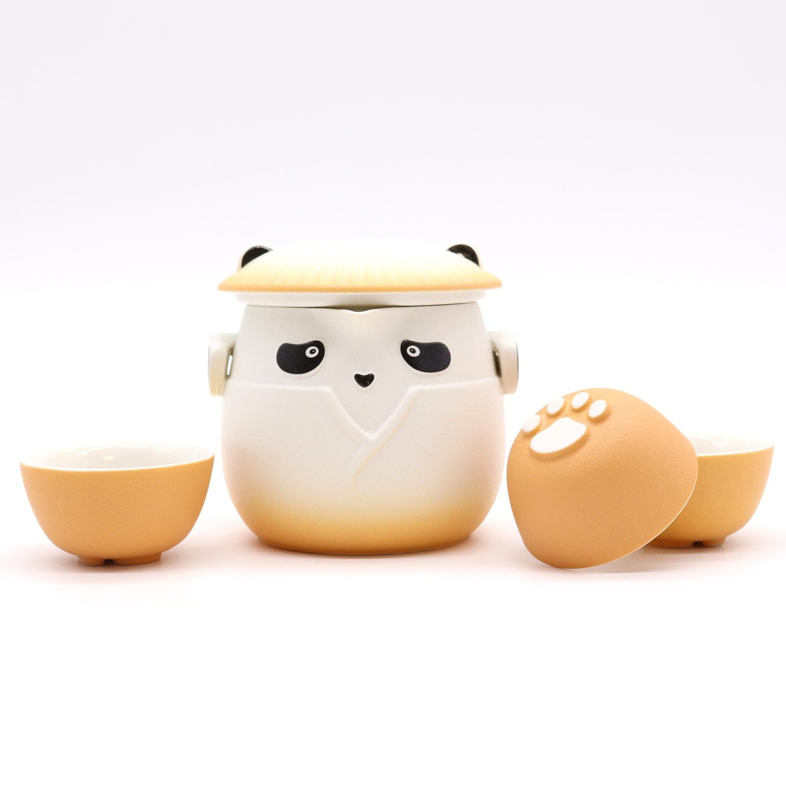 bG9jYWw6Ly9tZWRpYS9TTS8yRC82MFIzMEMxSDc0UjMyRFNNLzBkZDFhZTQ3LmpwZWc.jpg Ancient Wisdom Ceramic Panda Teapot & Three Cups Set - Orange - Image 1