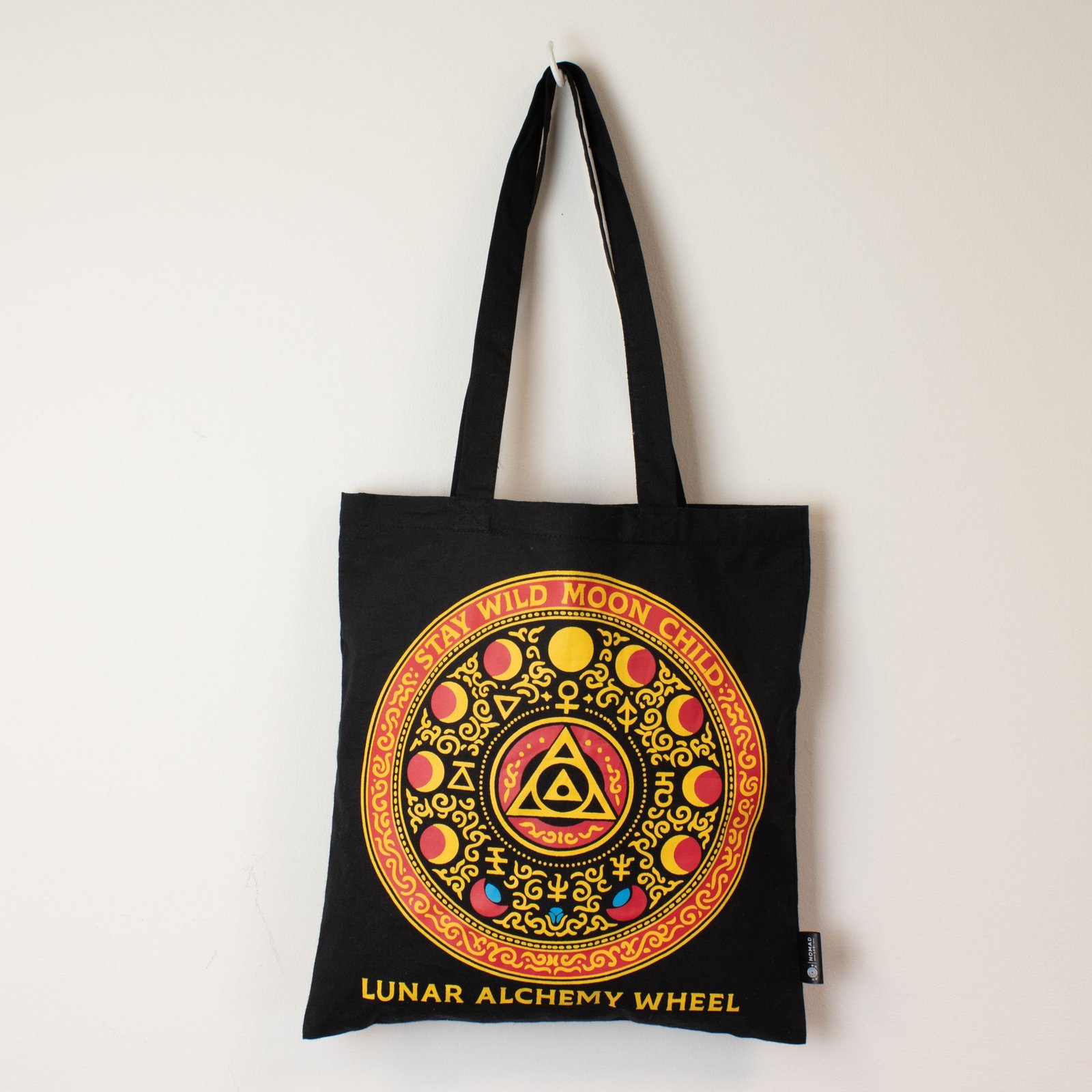 bG9jYWw6Ly9tZWRpYS9TUS9DQy82MFIzMEMxSjZDUzNDQ1NRL2ZmNDU2Y2U1LmpwZw.jpg Ancient Wisdom Iconic Black Cotton Classic Tote Bag – Luna Alchemy Wheel - Image 1