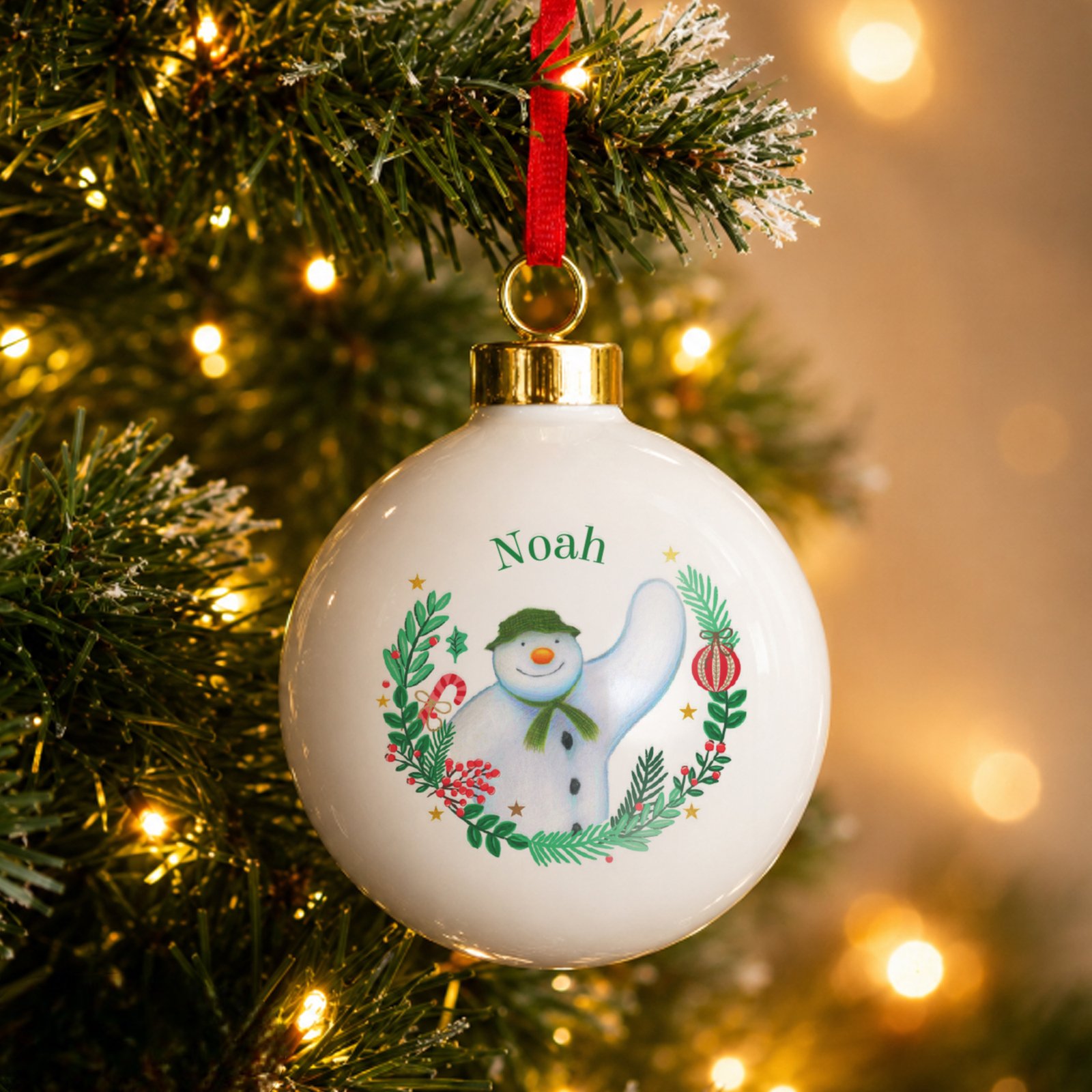 P0305J40 Personalised The Snowman Christmas Wishes Ceramic Bauble Personalised The Snowman Christmas Wishes Ceramic Bauble - Image 1