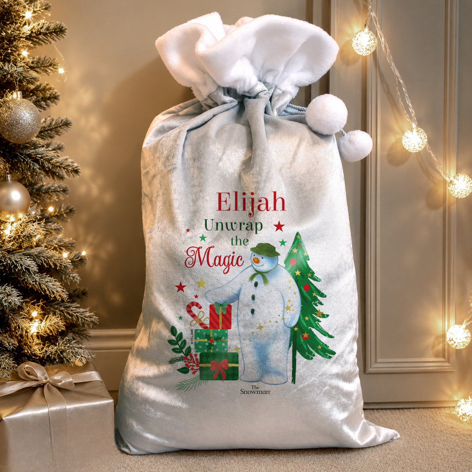 P0510J80_Personalised_The_Snowman_Unwrap_The_Magic_Grey_Christmas_Sack Personalised The Snowman 'Unwrap The Magic' Luxury Grey Pom Pom Christmas Sack - Image 1