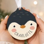 Personalised Cartoon Penguin Round Wooden Christmas Bauble - Image 2