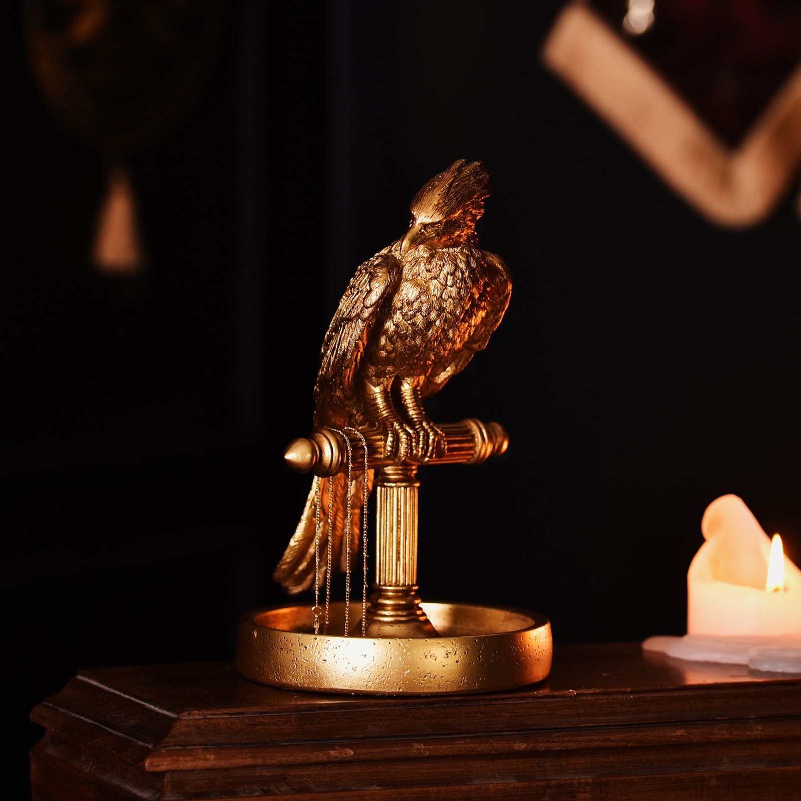 WB225_T01.jpg Harry Potter Alumni Gold Resign Jewellery Stand - Fawkes - Image 1