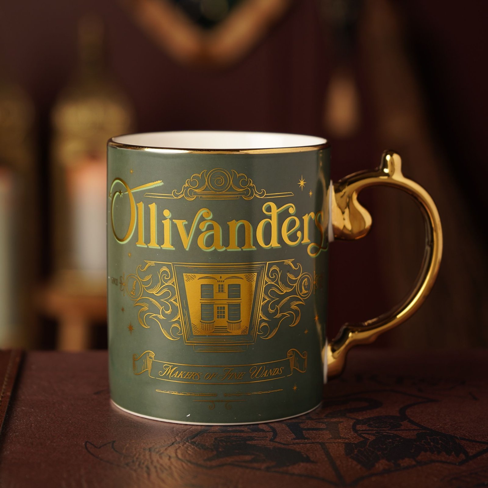 WB847.jpg Harry Potter Alumni Collectable Gold Handled Ceramic Mug – Ollivanders - Image 1