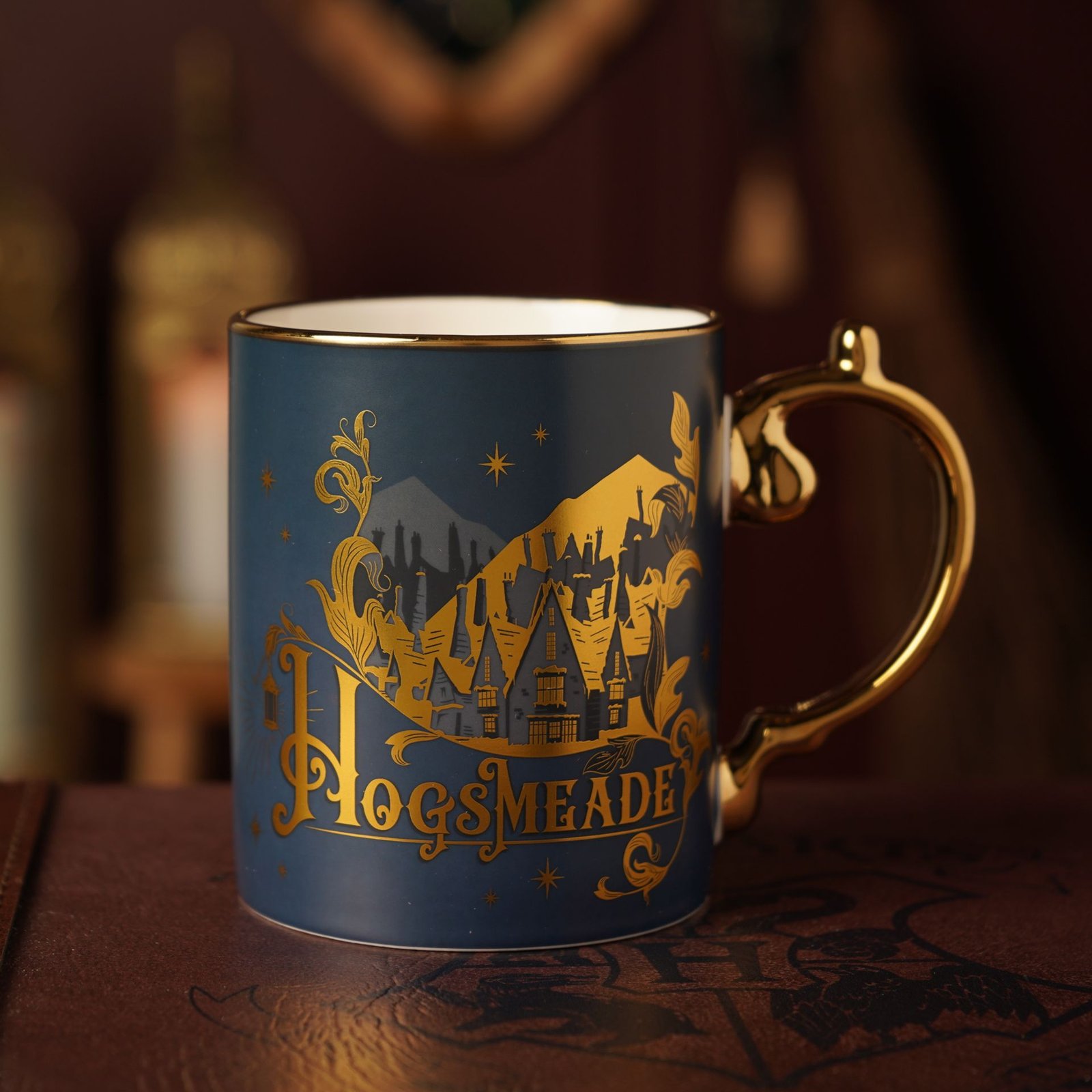 WB854.jpg Harry Potter Alumni Collectable Navy Blue & Gold Ceramic Mug - Hogsmeade - Image 1